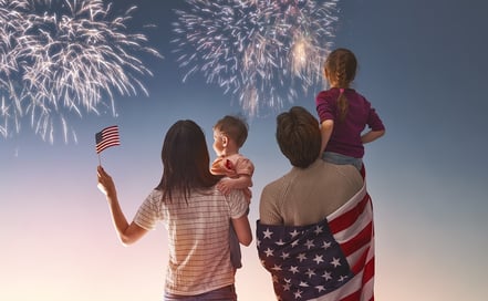 An image of a family enjoying 4th of July fireworks.