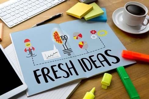 An image of a drawing on someone's desk that boasts "fresh ideas." An image of a drawing on someone's desk that boasts "fresh ideas."