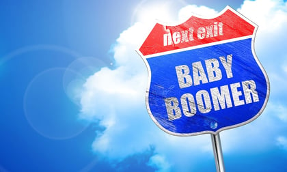 An image of a road sign that says, "Next Exit, Baby Boomer."